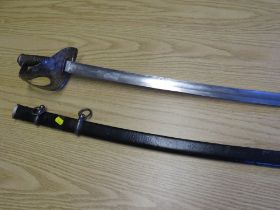 A 19TH CENTURY ITALIAN CAVALRY SABRE, marked A & EW, in black painted steel scabbard
