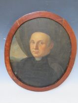 A LATE 18TH / EARLY 19TH CENTURY CONTINENTAL SCHOOL OVAL PORTRAIT STUDY OF A CLERIC, unsigned, oil
