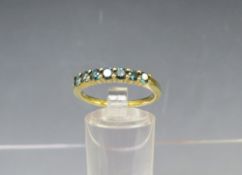 AN 18CT GOLD 'ILIANA' SEVEN STONE RING