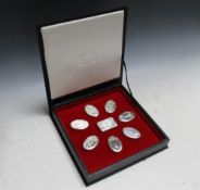A PRESENTATION BOX OF EIGHT HALLMARKED SILVER 'THE GUARDS REGIMENTS' SNUFF BOXES BY FRANKLIN