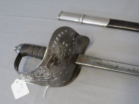 AN EDWARD VII INFANTRY OFFICERS SWORD, with solid hilt with ER VII cypher, the blade engraved with