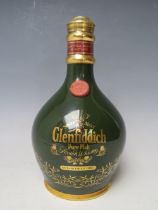 A GLENFIDDICH 18 YEAR OLD SINGLE MALT WHISKY 43%, presented in a green Spode ceramic decanter