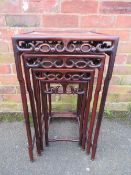 AN EASTERN QUARTETTO OF FOUR TABLES, each modelled in a traditional style with shaped supports,