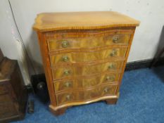 A REPRODUCTION MAHOGANY CROSSBANDED SERPENTINE CHEST OF FIVE GRADUATED DRAWERS, with brushing slide,