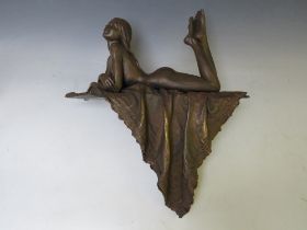 AN EBANO BRONZED SCULPTURE FROM THE VIDAL COLLECTION DEPICTING A NUDE RECLINING GIRL, No. 169 /