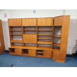 A LARGE MID CENTURY G-PLAN TEAK DISPLAY UNIT, with corner section, in four sections, H 199, W 271
