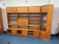 A LARGE MID CENTURY G-PLAN TEAK DISPLAY UNIT, with corner section, in four sections, H 199, W 271
