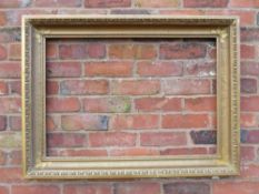 A GILT RECTANGULAR PICTURE FRAME, with egg and dart moulded detail, rebate 82 x 57 cm