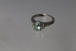 AN 18CT WHITE GOLD 'ILIANA' APATITE RING, with diamond set shoulders