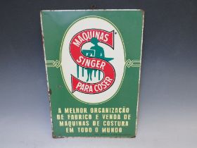 A VINTAGE 'MARQUINAS SINGER PARACOSER' ADVERTISING TIN SIGN, 49 x 34.5 cm