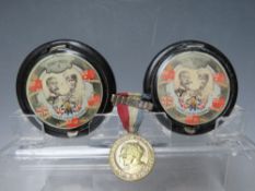 TWO 1935 SILVER JUBILEE POWDER COMPACTS, Dia. 7.5 cm, one A/F, together with a Silver Jubilee