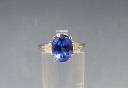 AN 18CT WHITE GOLD 'ILIANA' SAPPHIRE RING, with diamond set shoulders,ring size O ½