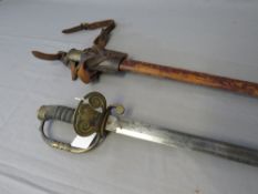 A VICTORIAN HONORABLE ARTILLERY COMPANY OFFICERS SWORD, etched blade with HAC crest, in leather