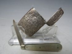 A HALLMARKED SILVER VESTA CASE, together with a silver bladed and mother of pearl fruit knife (2)