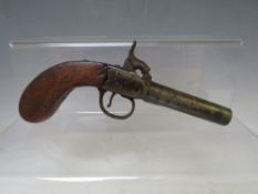 A SMALL 19TH CENTURY PERCUSSION PISTOL, with wooden handle, barrel L 8 cm, overall L 18 cm