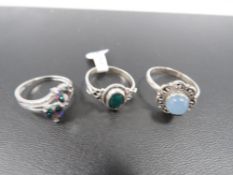 THREE DECORATIVE SILVER DRESS RINGS TO INCLUDE A MYSTIC TOPAZ STYLE EXAMPLE