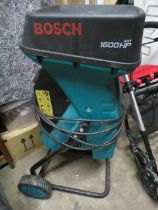 A BOSCH 1600 HP AXT BRANCH SHREDDER