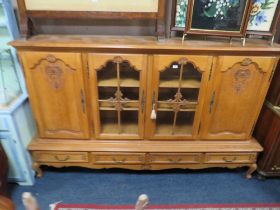 A LARGE FRENCH STYLE OAK GLAZED DRESSER H 145 W 230 CM