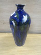 A COBRIDGE TRIAL BALUSTER VASE, decorated with blue floral pattern, impressed factory marks, H 24