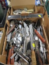 A TRAY OF ASSORTED FLATWARE , CUTLERY ETC