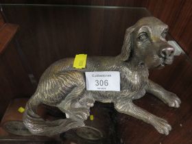 A CAST METAL DESK TOP MODEL OF A DOG