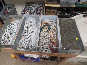 THREE GALVANIZED TOTE BOXES / TRAYS OF HORSESHOES TOGETHER WITH A TRAY OF RETRO MILK BOTTLES (4