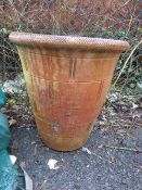 AN EXTRA LARGE TERRACOTTA PLANTER