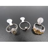 THREE ASSORTED SILVER DRESS RINGS