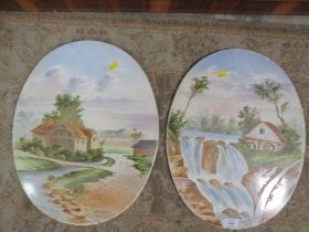 TWO LARGE OVAL CERAMIC HAND-PAINTED PLAQUES