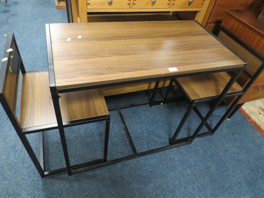 A MODERN TABLE WITH TWO CHAIRS