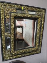A VINTAGE CUSHION FRONTED AND GILT WALL MIRROR 67 X 58 CM