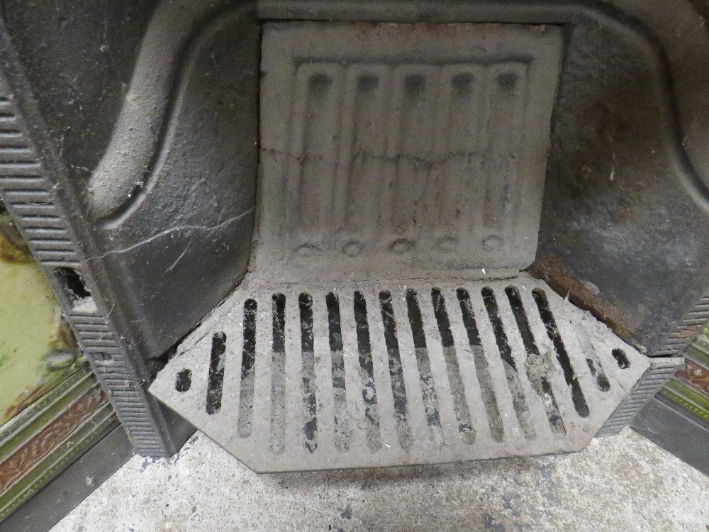 A VINTAGE CAST IRON FIRE SURROUND WITH INSET TILES A/F - Image 3 of 7
