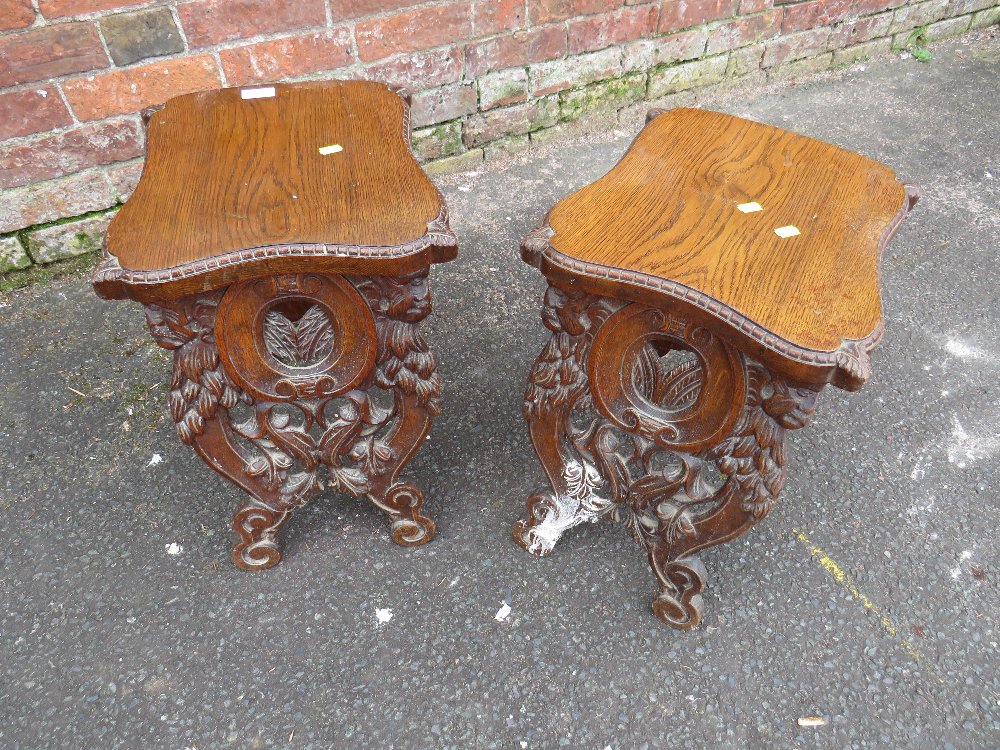 A PAIR OF UNUSUAL CARVED OAK VINTAGE STOOLS
