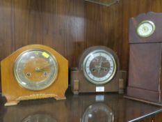 THREE VINTAGE MANTLE CLOCKS ONE IN FORM OF A LONG CASED CLOCK A/F