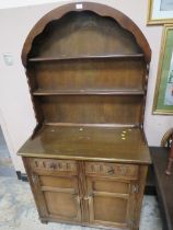 AN OAK ARCHED DRESSER