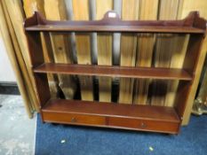 A REPRO MAHOGANY SHELF RACK WITH DRAWERS