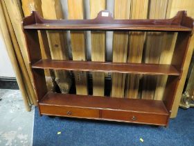 A REPRO MAHOGANY SHELF RACK WITH DRAWERS