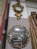 A REPRODUCTION GILT WALL CLOCK AND GILT WALL MIRROR (2)