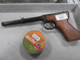 A VINTAGE DIANA MODEL 11 AIR PISTOL WITH PELLETS