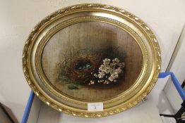 A SMALL OVAL OIL ON BOARD OF A BIRDS NEST & FLOWERS, INITIALLED LOWER RIGHT L.E.L , 19 x 24 cm -