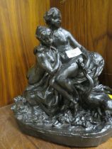 A HEAVY CAST MODEL OF A SEMI-NUDE FEMALES WITH A SWAN