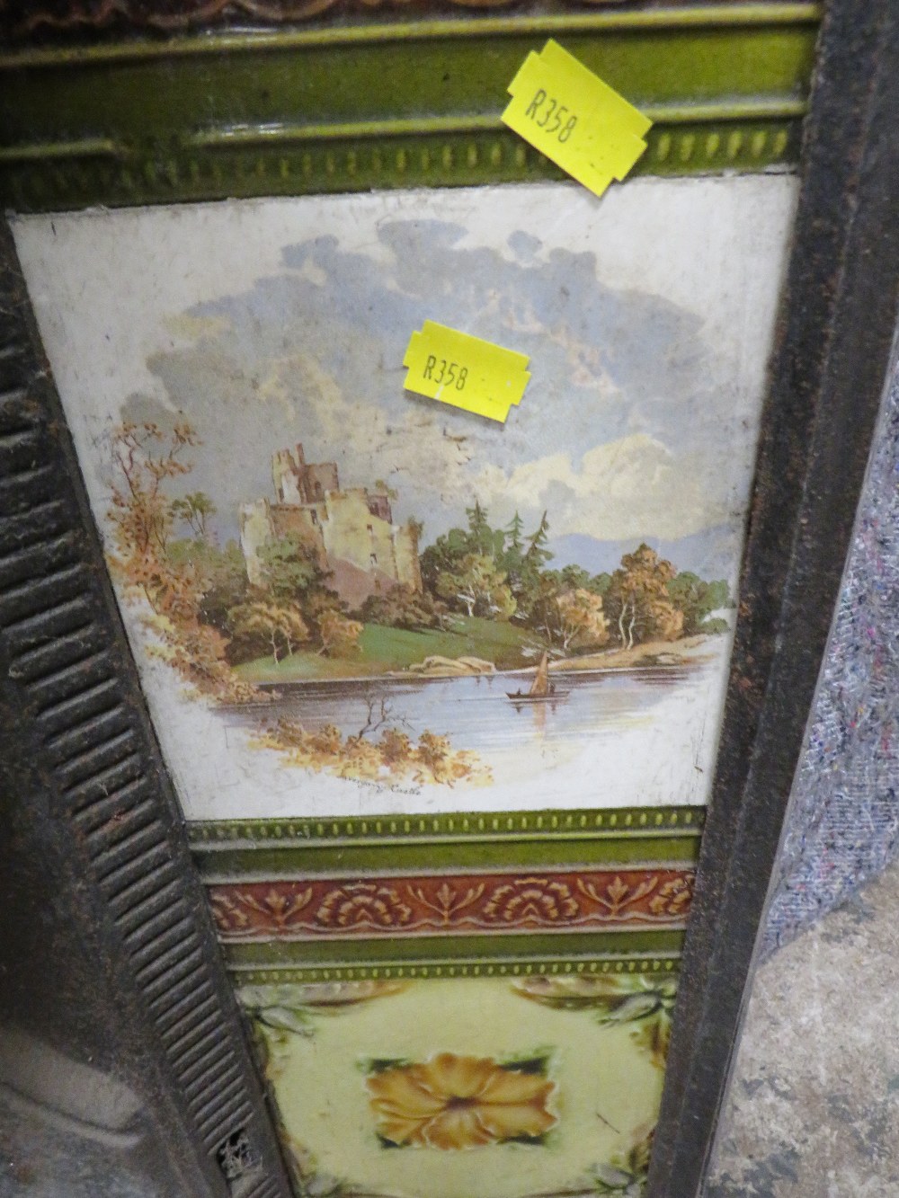 A VINTAGE CAST IRON FIRE SURROUND WITH INSET TILES A/F - Image 5 of 7