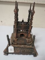 A VINTAGE METAL MODEL OF AN EASTERN TEMPLE