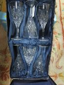 A BOXED SET OF SIX STUART CRYSTAL WINE GLASSES TOGETHER WITH A DECANTER ETC
