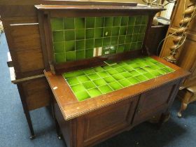 AN EDWARDIAN MAHOGANY AND INLAID WASHSTAND WITH TILED BACK