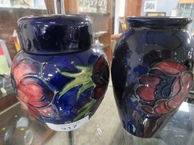 A MOORCROFT GINGER JAR TOGETHER WITH A SMALL VASE