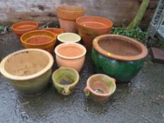 A SELECTION OF ELEVEN TERRACOTTA PLANTERS TO INCLUDE CERAMIC EXAMPLES