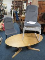 A BOXED PAIR OF KEILA GREY DINING CHAIRS AND A BOXED NATURAL OAK FAWLER COFFEE TABLE * CONTENTS