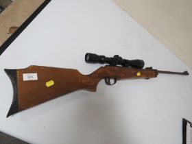 A VINTAGE WEBLEY & SCOTT LIMITED BIRMINGHAM POINT 22 AIR RIFLE WITH LATER TELESCOPIC SIGHT