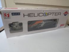 A REMOTE CONTROLLED HELICOPTER (UNCHECKED)
